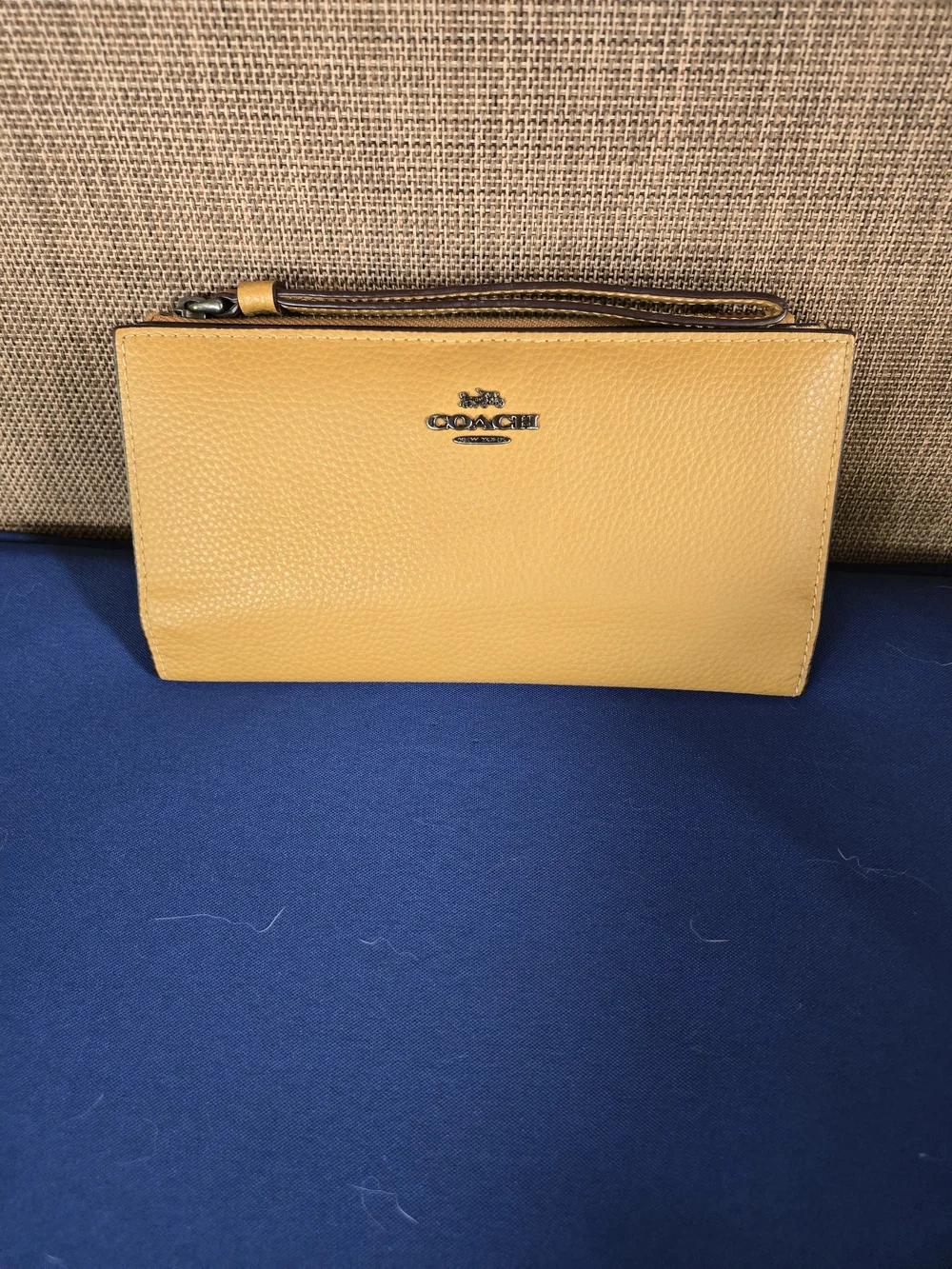 Coach Pebbled Leather Wristlet in Mustard Yellow with Gunmetal Logo